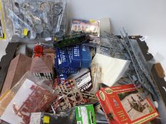 A collection of model kits, kit parts and accessories including decals,