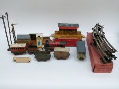 Fourteen Hornby 0 gauge locomotives, carriages, wagons and accessories including stations,