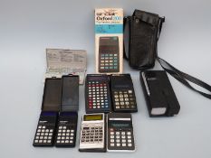 Four vintage Sinclair calculators comprising Scientific Programmable and Oxford 200 in original box,