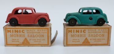 Two Tri-ang clockwork Morris saloon cars,