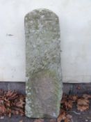 A carved natural stone marker or milepost with number 17 carved to top (approximate H89 x W29 x