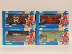 Four Corgi On the Move limited edition diecast model vans,