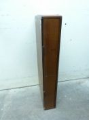 A G-Plan style two-drawer wall-mounted telephone unit