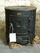 A Clarke wood burning stove (H47 x W43cm)