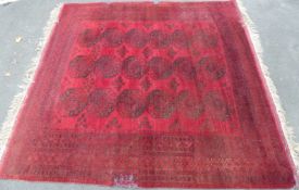 A large red ground rug