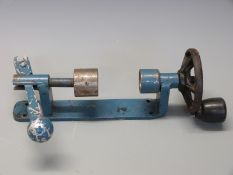 An 8 bore cartridge loading roll-over tool.