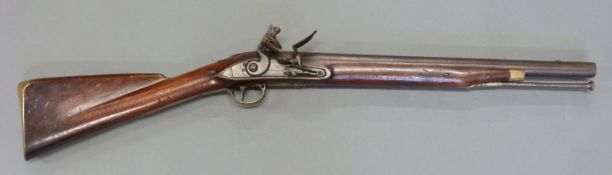 Harvey Walklate Mortimer of London 12 bore flintlock hammer action coaching gun with named lock,