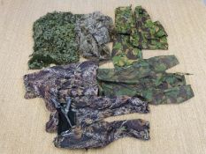 A collection of camouflage clothing,