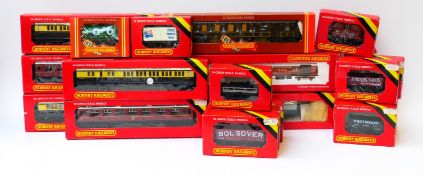 Twenty Hornby 00 gauge carriages and wagons including an Operating LMS Royal Mail Coach Set,