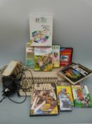 Commodore A-500 Plus Amiga computer together with a quantity of ZX Spectrum games