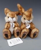 Two Steiff Teddy bears Poppel rabbits both with brown fur, white tails and noses and printed pads,
