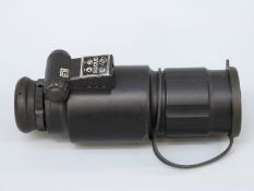 Gnome spotting scope with built in light, serial number N00691, in canvas carry case.