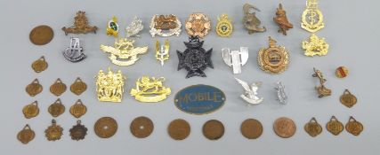 A quantity of Rhodesian military badges including RAMC, Engineers,