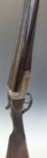 BSA 12 bore side by side ejector shotgun with named lock, chequered grip and horn tipped forend,