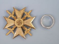 A reproduction Nazi German Spanish Cross and SS ring