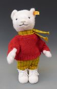 Steiff Teddy bear Rupert with white mohair, red jumper, yellow tartan trousers and scarf,