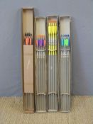 Four boxes of seven Longshot archery arrows.