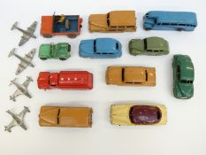 Fifteen Dinky Toys diecast model cars, buses and aeroplanes, some military.