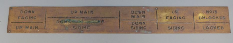 A brass railway signal box plate, numbered to one side 12 to 19 including colliery, points etc.