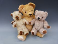 Three vintage teddy bears including a jointed mohair example