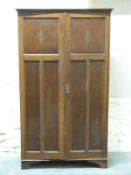 A panelled and beaded oak wardrobe (H177 x W90cm)