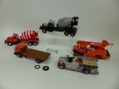 Five First Gear diecast model American construction and commercial vehicles including cement mixers,