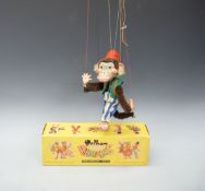 Pelham Puppets Display Range monkey with brown moulded head, red felt fez and green waistcoat,