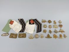 A collection of British Army cap badges to include 20th Hussars, the Green Howards,