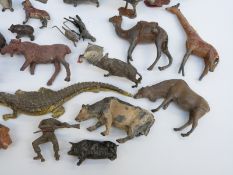 Eighty Britains and similar mainly lead zoo animals and soldiers including camels, zebra, giraffes,