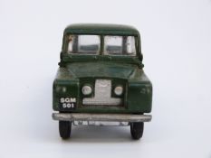 Three Spot-On by Tri-ang diecast model vehicles and accessories comprising LWB Land Rover,