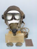 A WWII Lancaster Bomber flying helmet, mask, loom and goggles,
