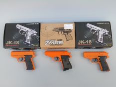Three 6mm BB or airsoft pistols two JK-18 and one ZM02, all in original boxes.
