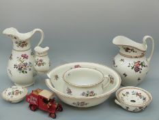 A washstand set decorated with flower sprays