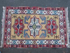 A Persian red ground rug