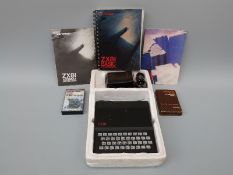 Sinclair ZX81 vintage computer with two programmes / games and paperwork, some in original boxes.