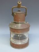 A copper ship's masthead or similar lamp,