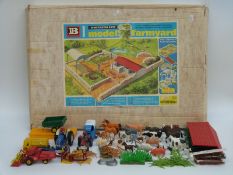 Britains Model Farmyard 4711 in original box together with a collection of Corgi,