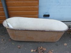 A vintage galvanised bath