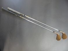 Two 60° Cleveland golf wedges