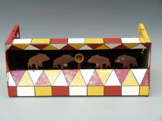 A fairground air rifle shooting target with painted decoration