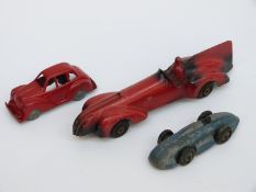 Three early Timpo Toys and similar diecast model vehicles comprising two racing cars and a saloon
