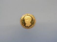 An Edward Whymper commemorative gold coin, 3.