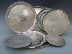 A large galleried oval silver plated tray, width 51cm, and various salvers,