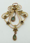 A 9ct gold Edwardian pendant set with seed pearls and topaz, 2.