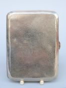 A white metal cigarette case with regimental crest and names of German or similar soldiers