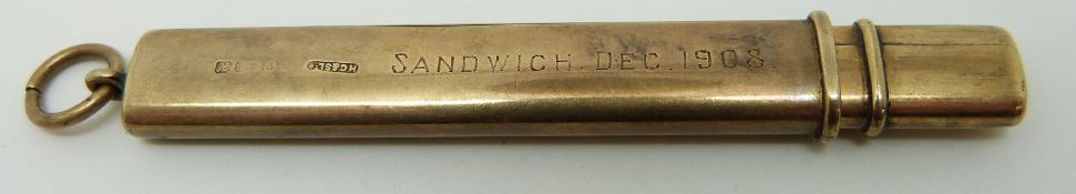 A 9ct gold pencil holder, 9.