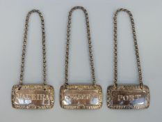 A harlequin set of 19thC hallmarked silver bottle tickets comprising Sherry (Birmingham 1922),