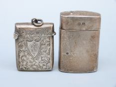 An Edward VII hallmarked silver vesta, Birmingham 1907 and a similar size container,