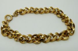 A yellow metal bracelet, 18.