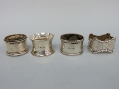 Four various hallmarked silver napkin rings,
